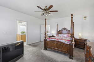 Spacious room with light gray carpeting and white painted walls