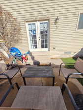Exterior patio area featuring concrete hardscaping