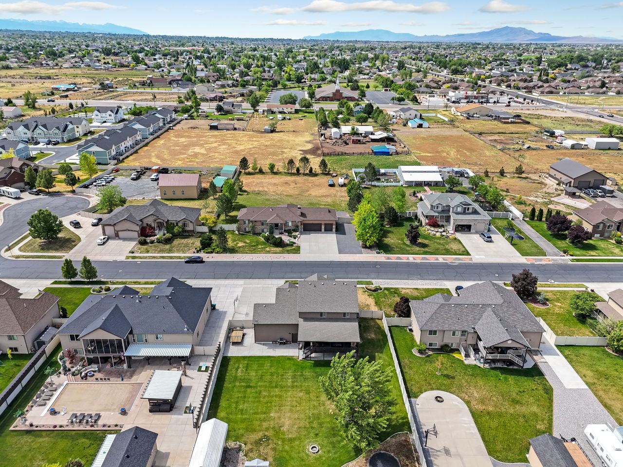 Expansive neighborhood showcasing a variety of architectural styles and landscaping