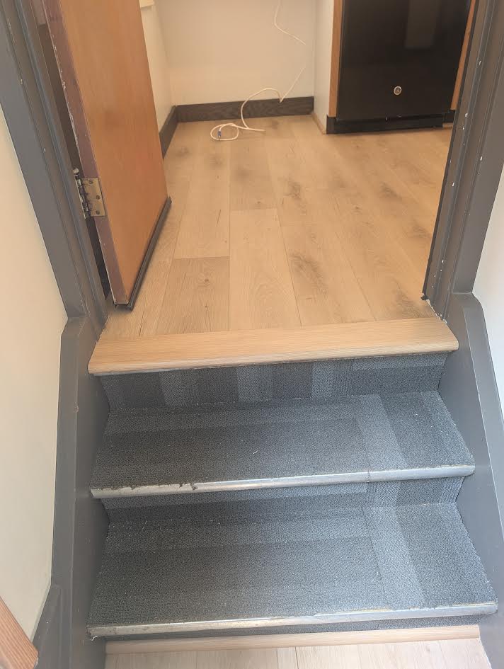 New LVP flooring in the kitchen and rear entry.