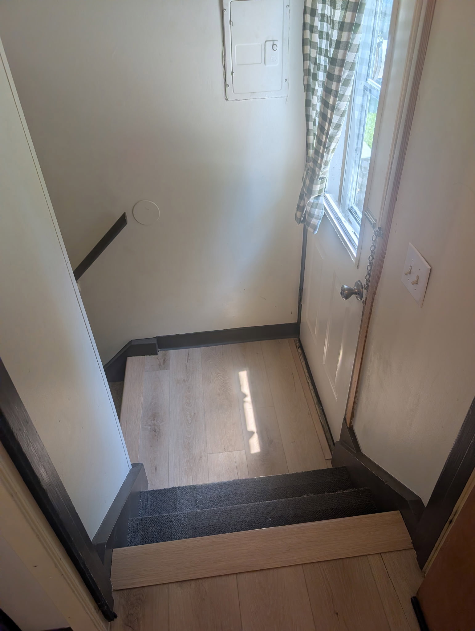 The back door landing and kitchen have brand new LVP flooring.