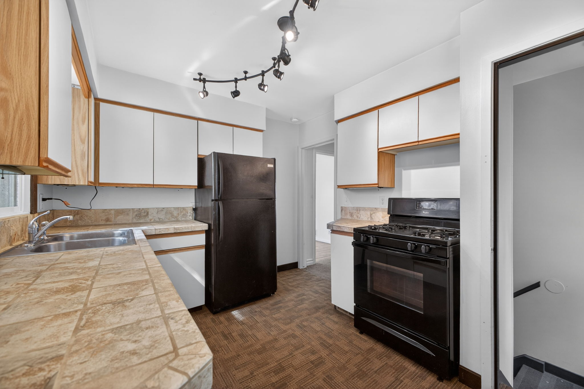 Kitchen with brand new LVP flooring.
