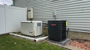 Generac Whole House Generator.  New A/C Unit.