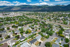 Aerial perspective showcasing a residential neighborhood with varied home styles