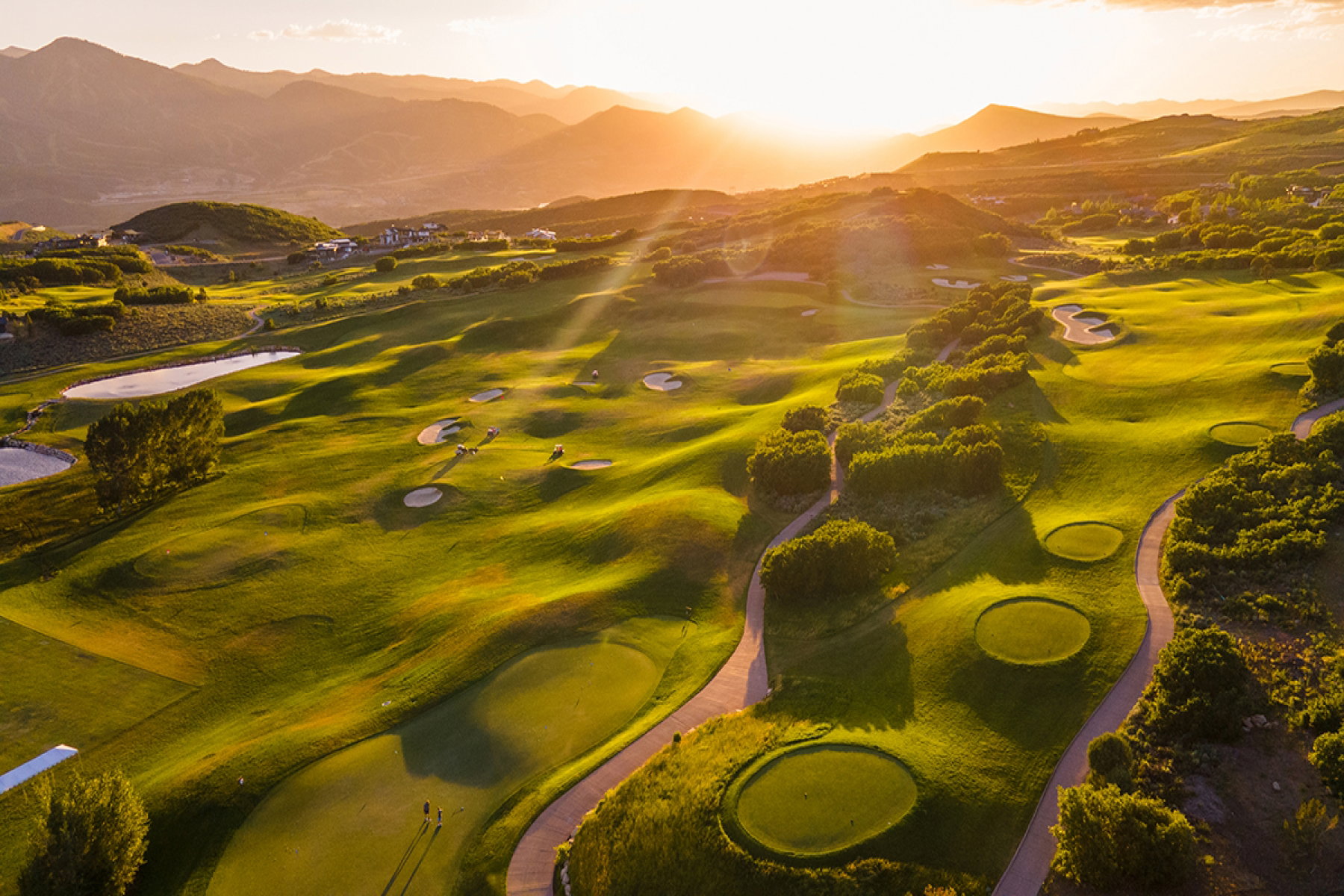 Expansive golf course with manicured greens and fairways
