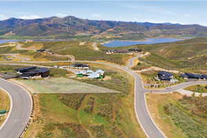 Expansive hillside lot with mountain and reservoir backdrop