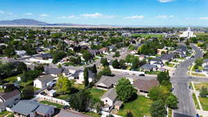 Expansive neighborhood featuring numerous residential properties with mature landscaping and paved streets