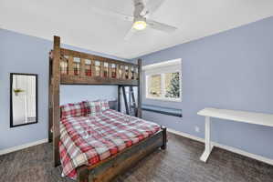 Bedroom featuring a built-in wooden bunk bed structure