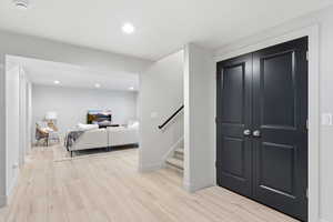 Light LVP-finish flooring throughout, complemented by crisp white trim
