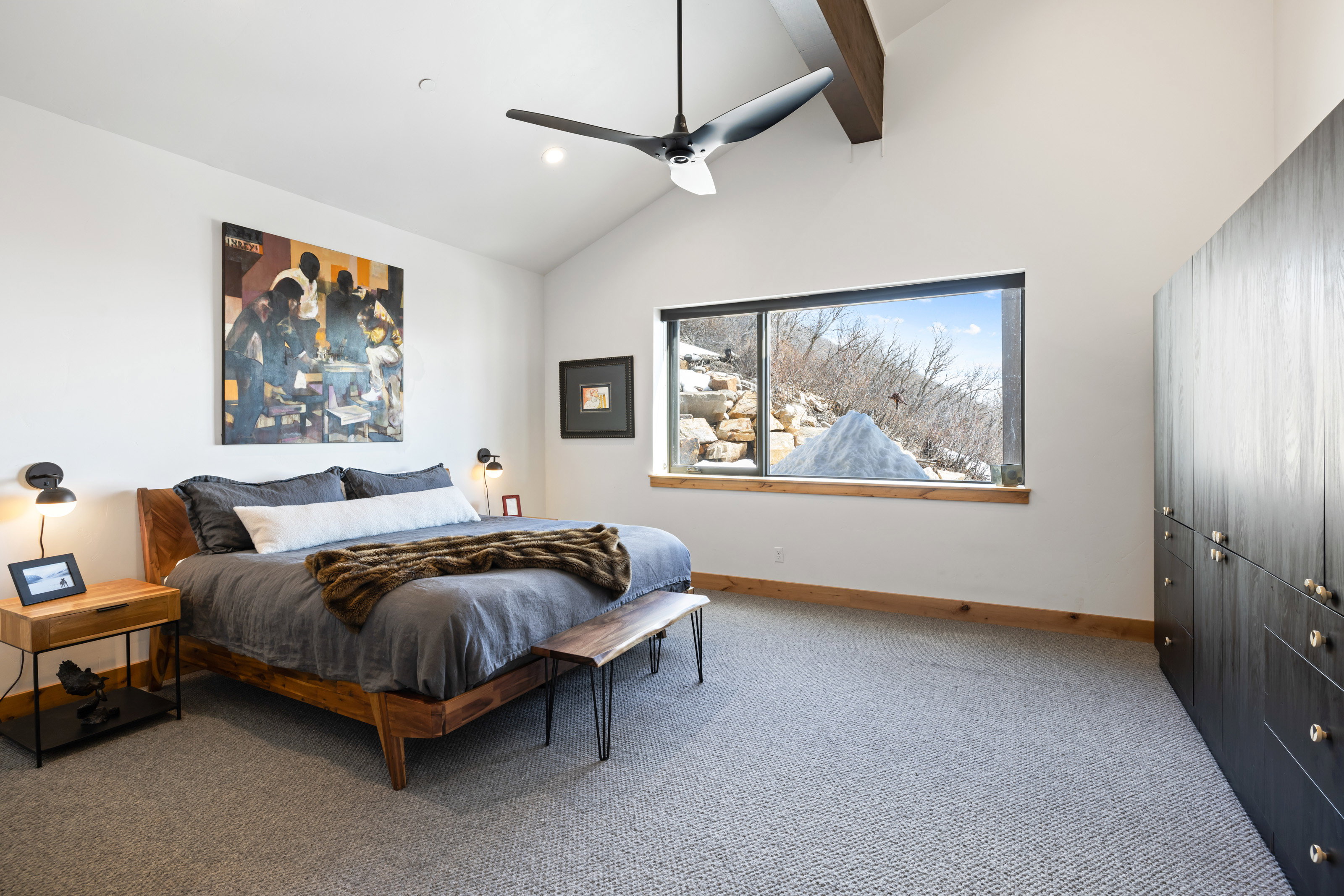 Bedroom with light carpet, a ceiling fan, lofted ceiling, and recessed lighting