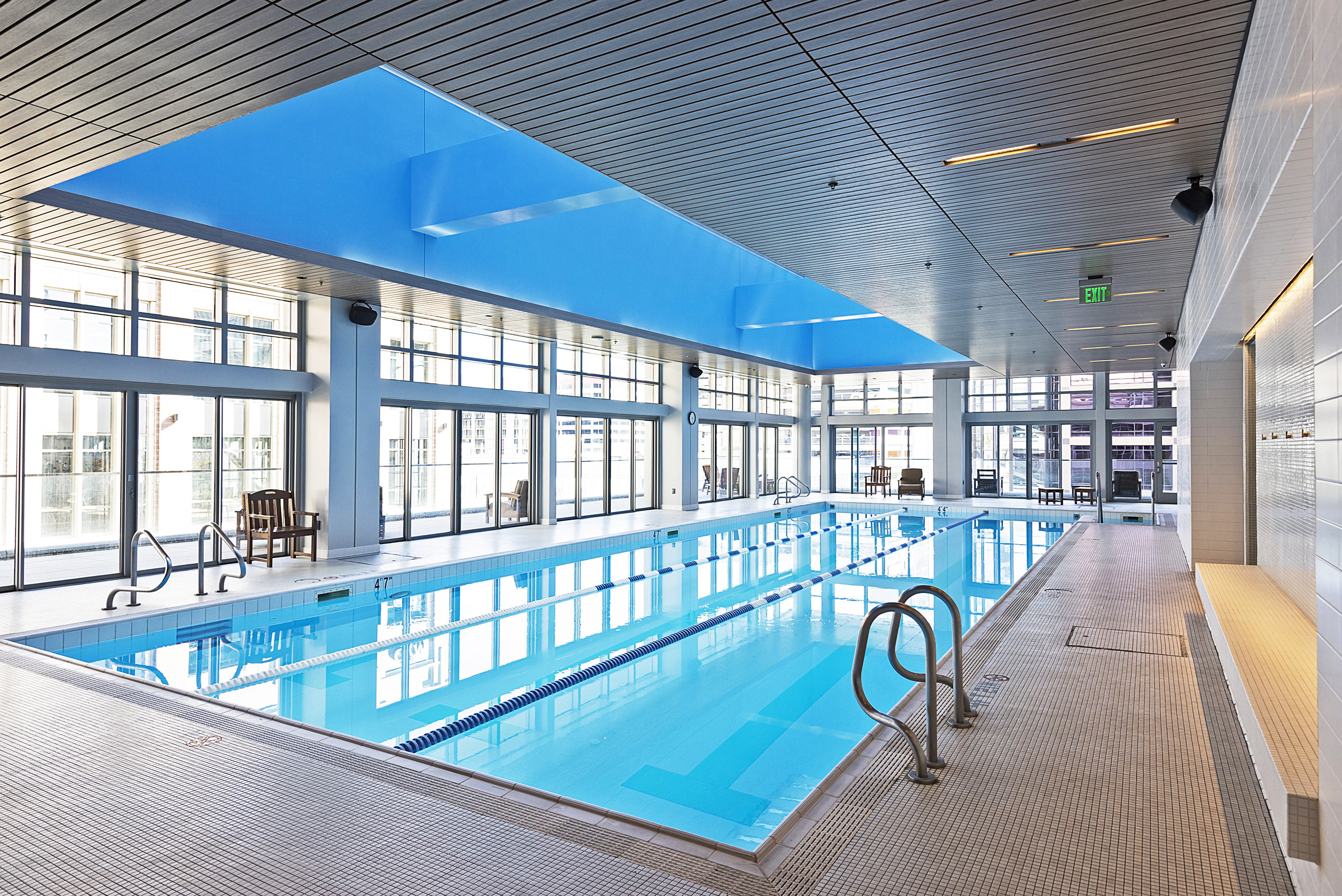 Indoor lap pool with integrated lane lines and stainless steel handrails