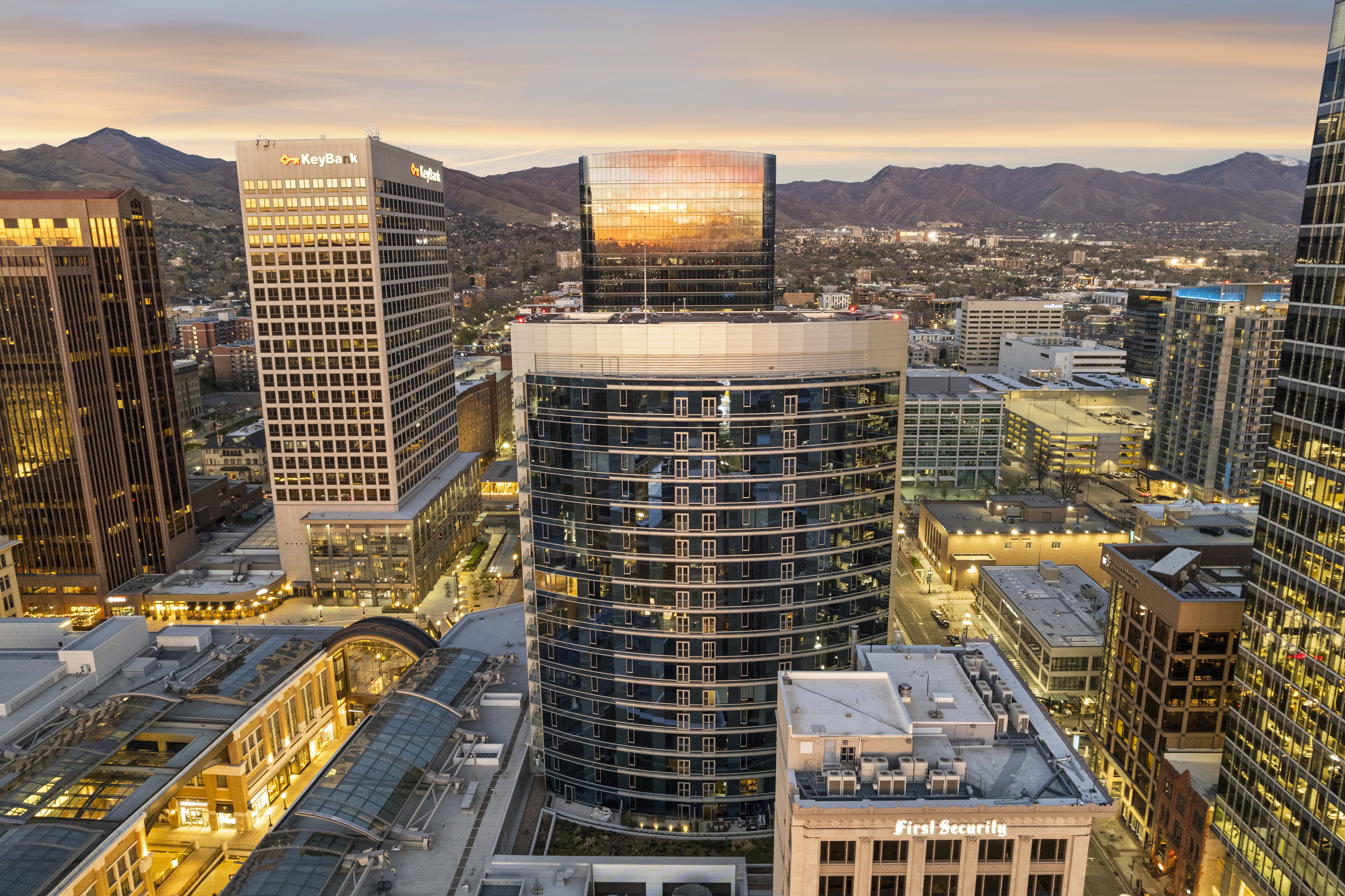 A vibrant city setting featuring multiple high-rise buildings and architectural elements