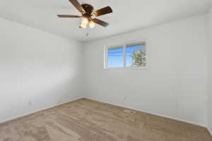 Neutral tone wall finish with a double-pane window