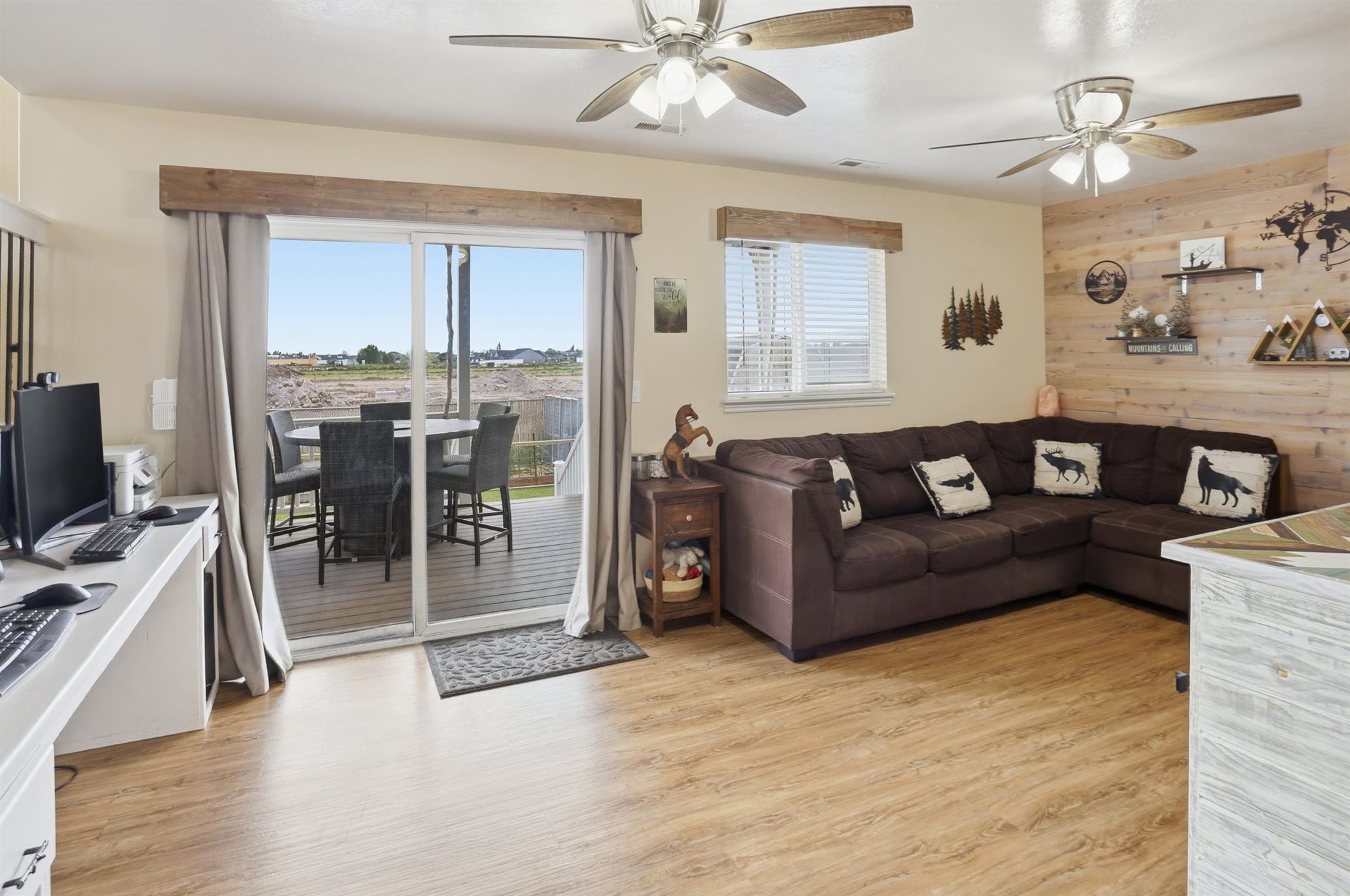 Family room with walkout doors to covered deck