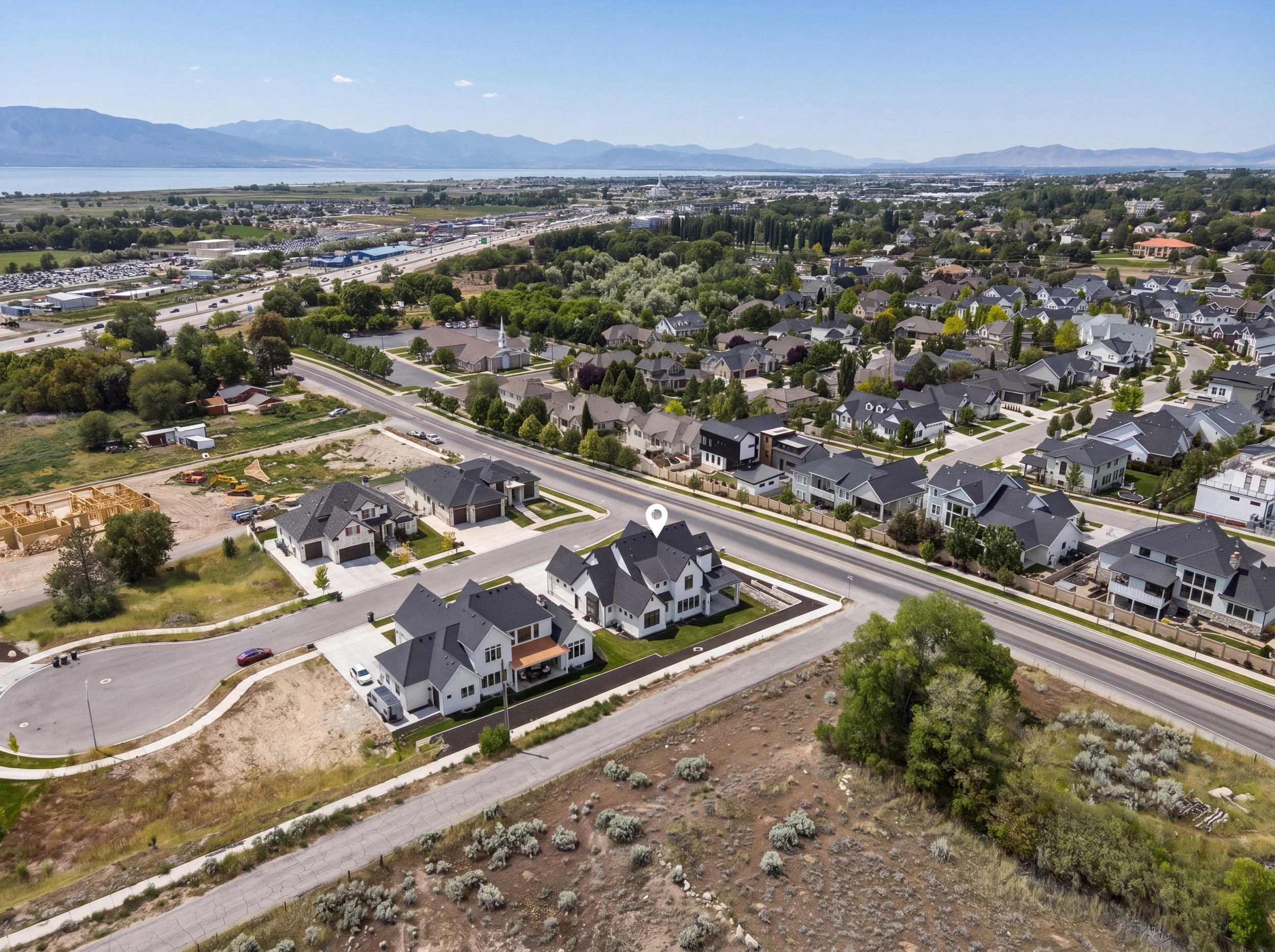Aerial perspective showcasing a developed neighborhood with new construction