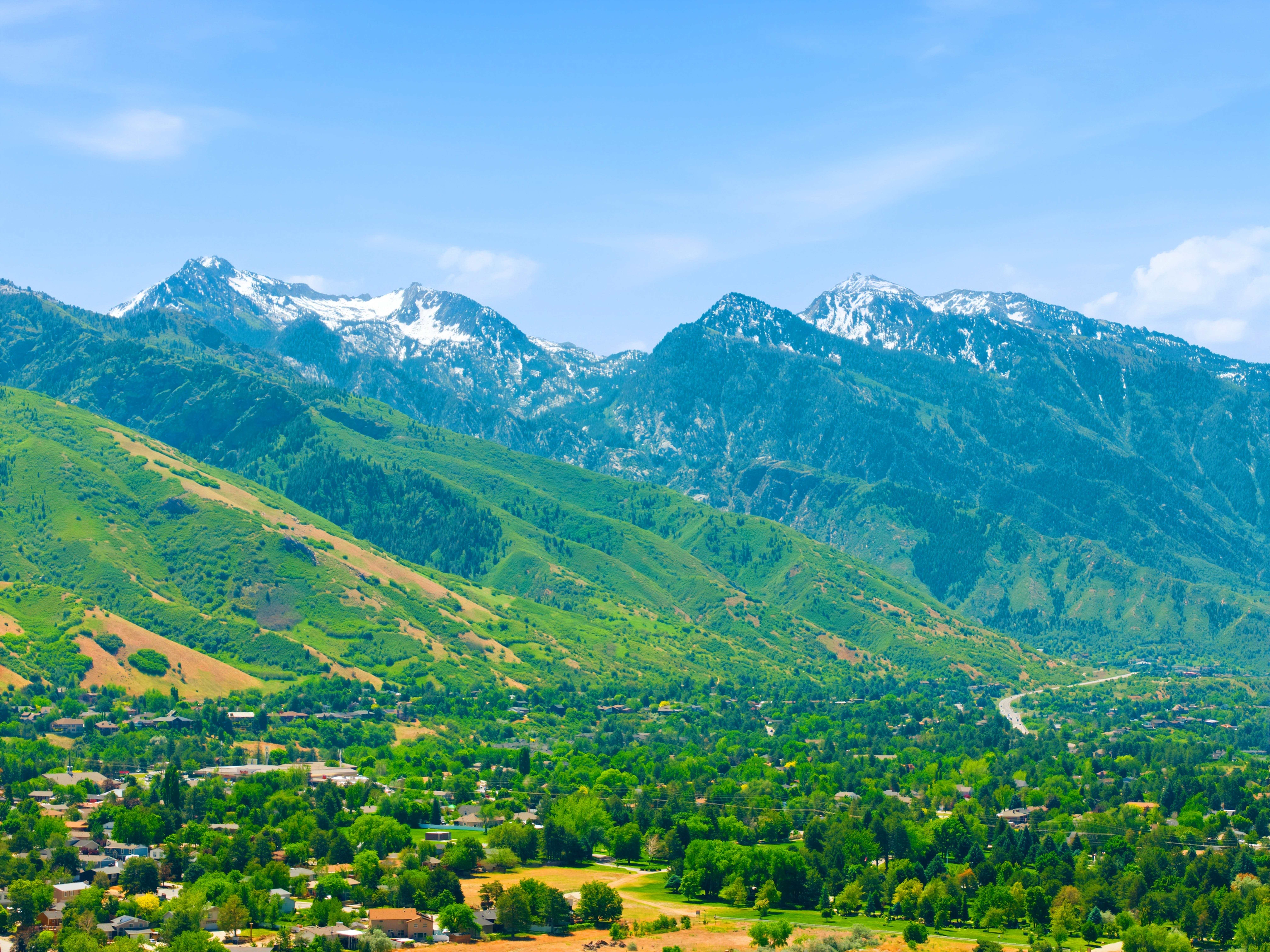 Expansive mountain range with snow-capped peaks