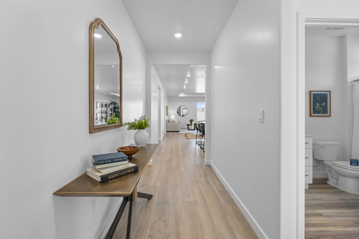 Hallway featuring wood-finish flooring and recessed lighting