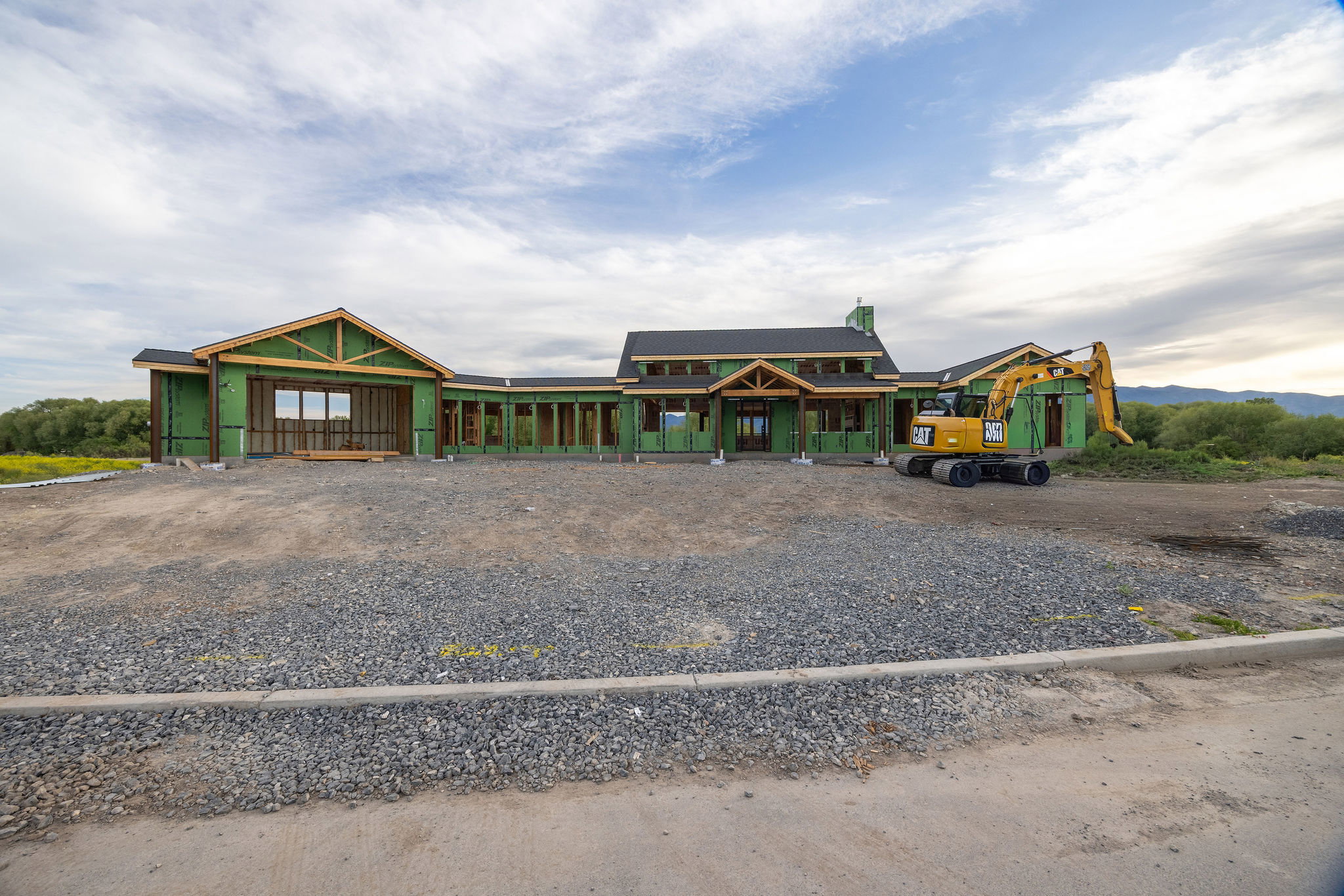 New construction featuring framing and roof installation