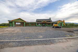 New construction featuring framing and roof installation