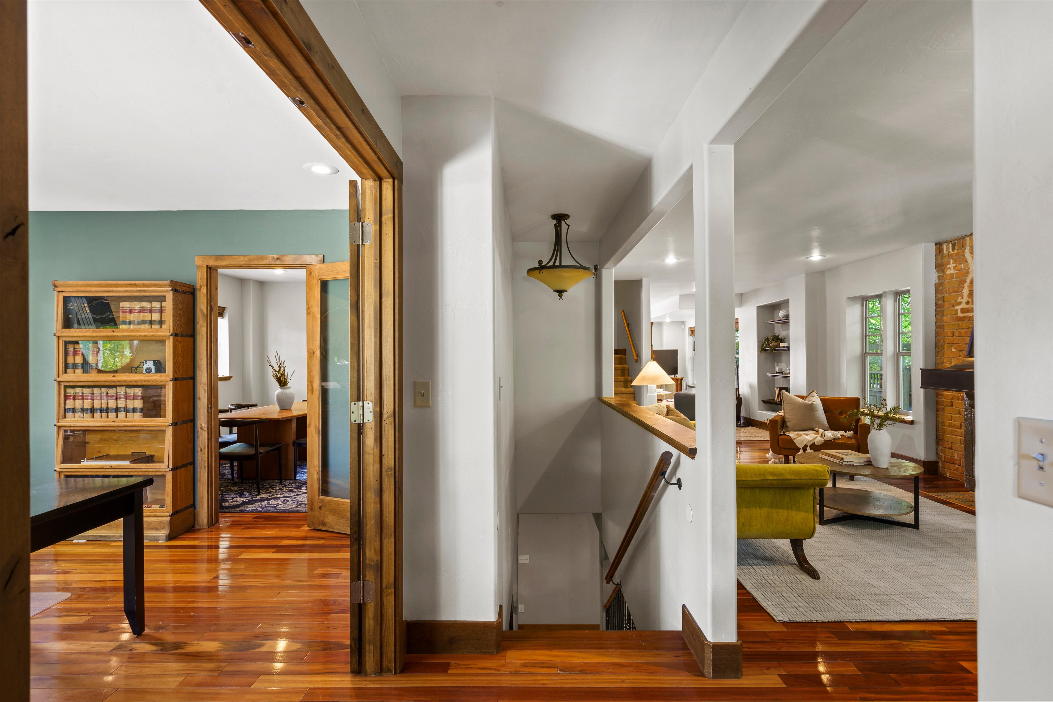 Entryway, with hardwood flooring throughout the main level living area