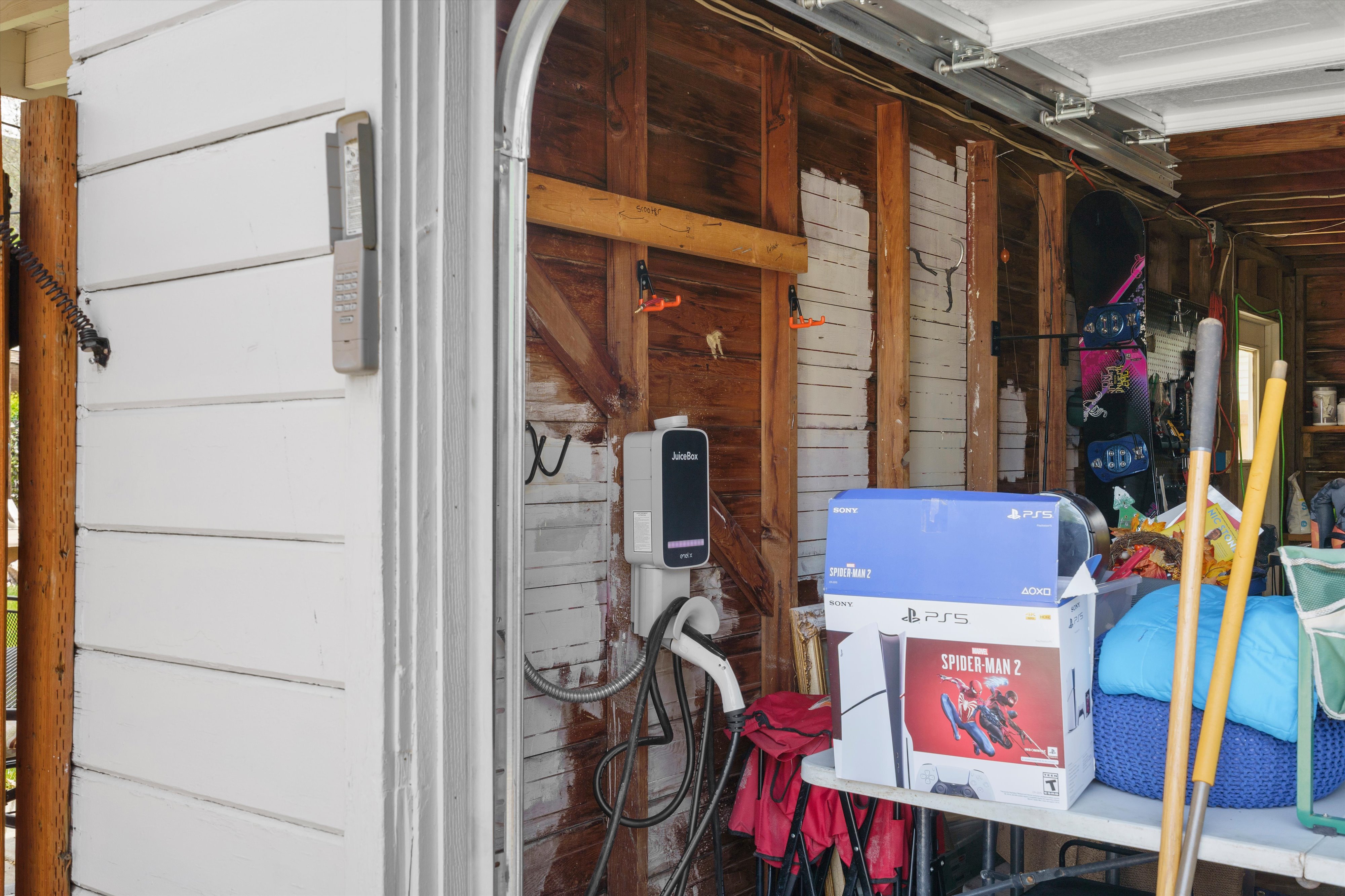 Garage interior featuring EV charging station