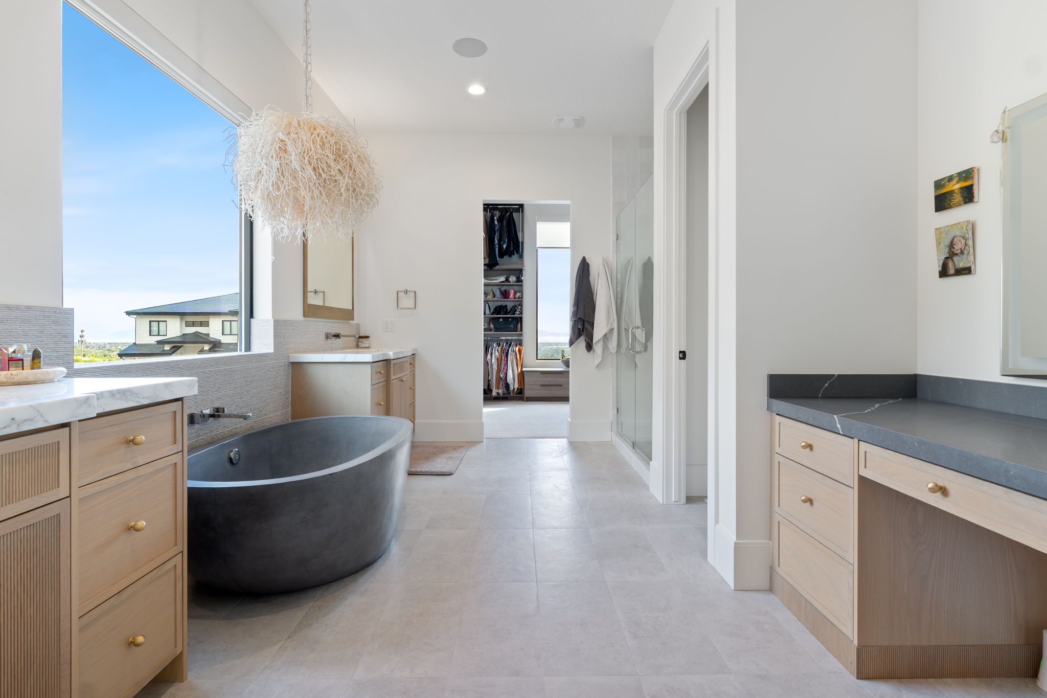Freestanding soaking tub with a large picture window