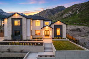 Modern architectural design featuring stone and dark paneling accents