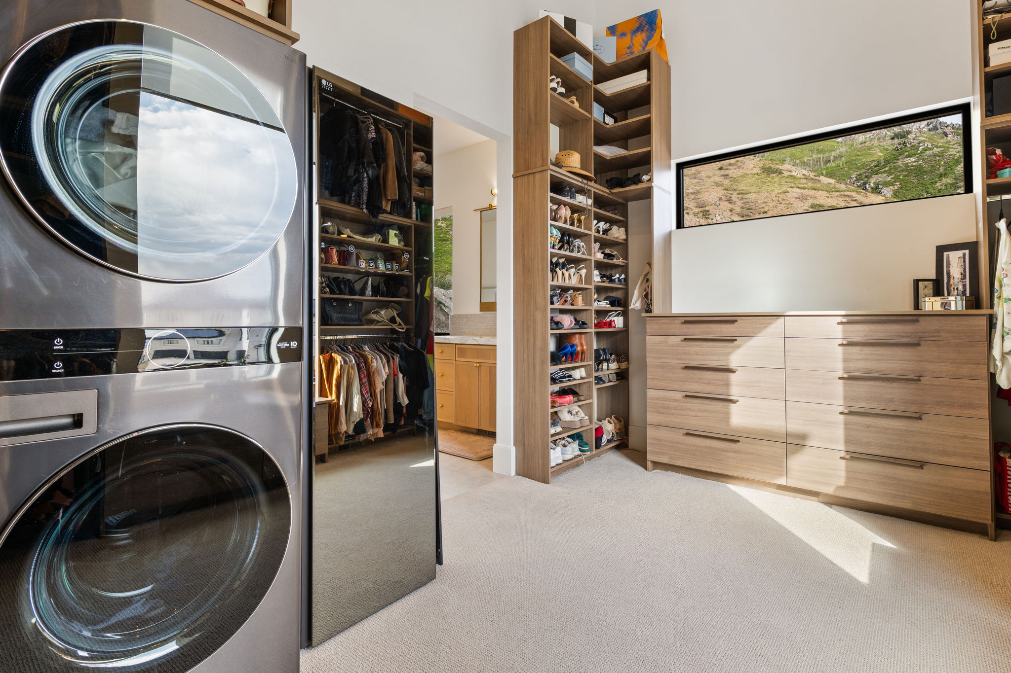Integrated laundry appliances featuring a stacked washer and dryer