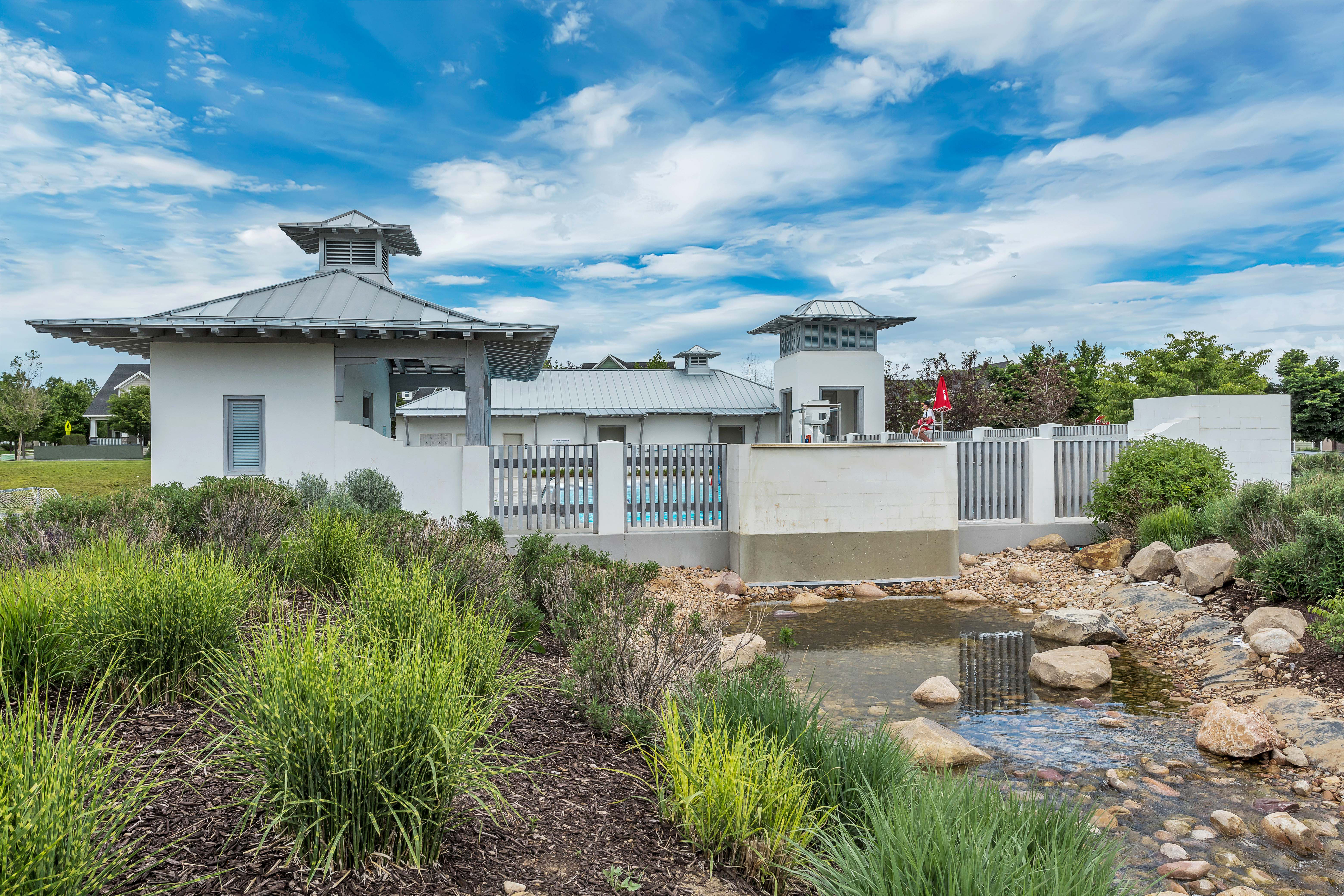 Contemporary architectural structures with corrugated metal roofing