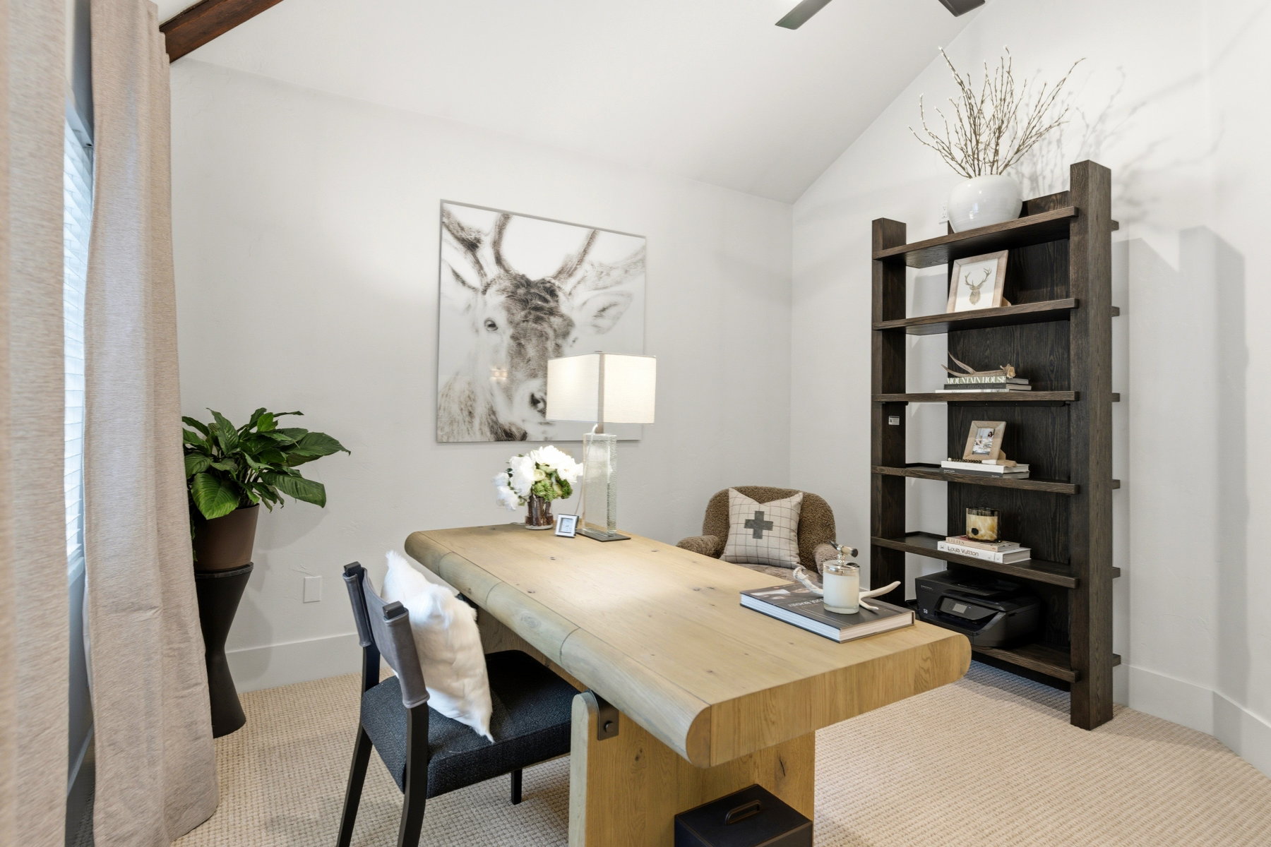 Vaulted ceiling with an exposed wood beam