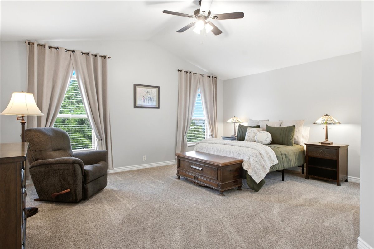 Spacious primary suite with views looking to the west over the valley