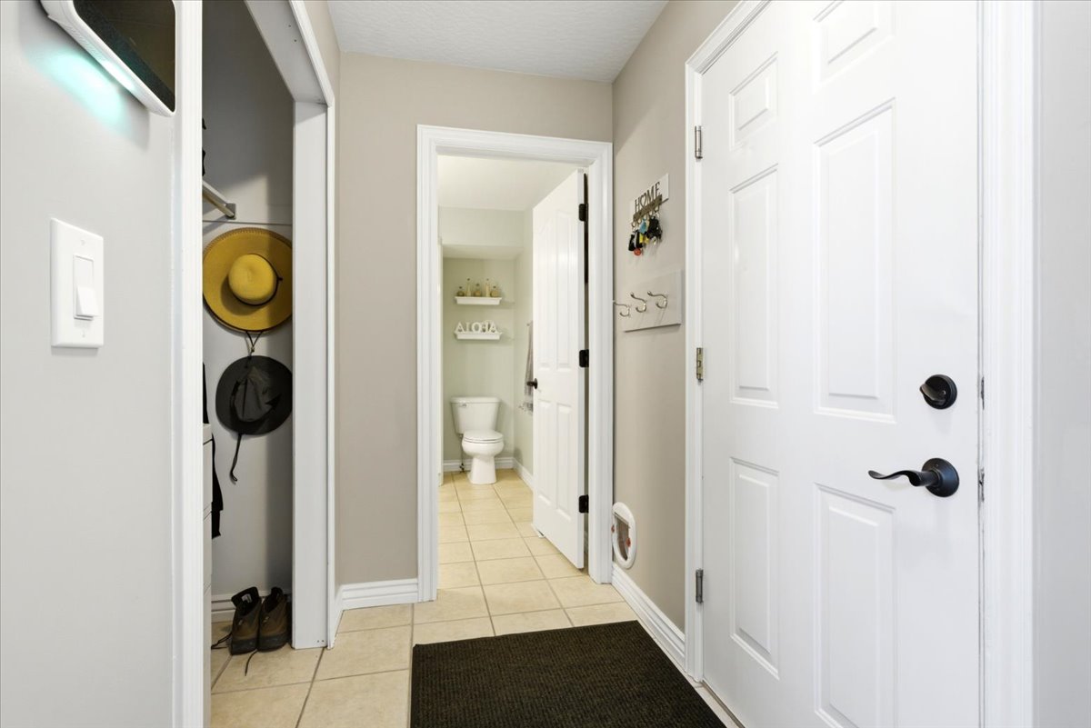 Entrance to garage and ¾ bath