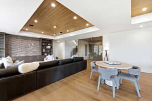 Recessed ceiling detail with wood-finish paneling and integrated lighting