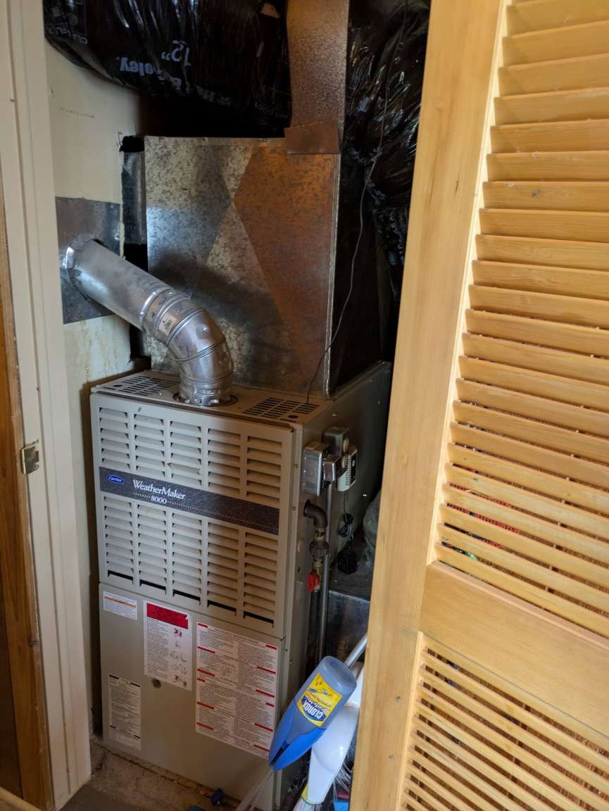 HVAC system with metal ductwork and insulated air handler