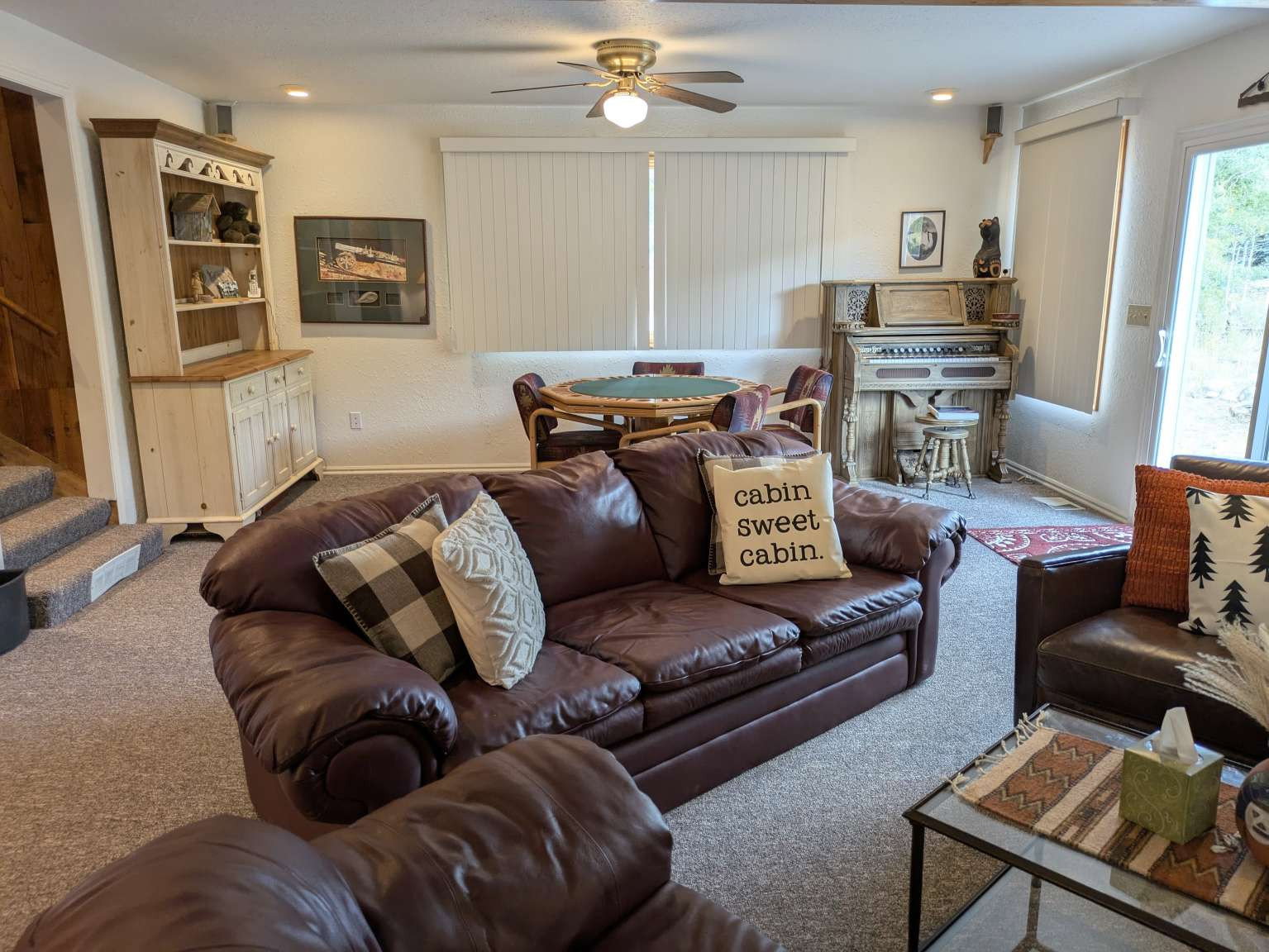 Spacious interior with neutral-toned carpeting and white walls