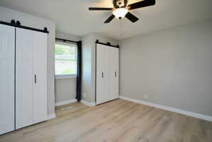 Master Bedroom Double Closets with Area for Cozy Chair