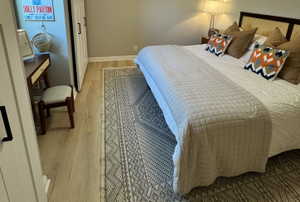 Showing Vanity Table and Stool between Closets