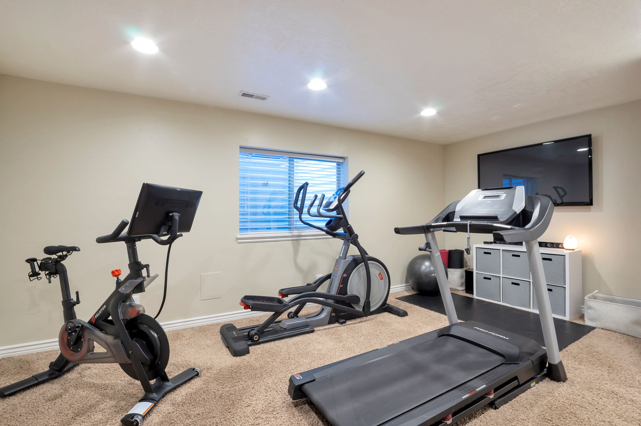 Flexible lower-level room ideal as a bedroom, guest suite, home gym, craft room, hobby space, or private office to fit your lifestyle.