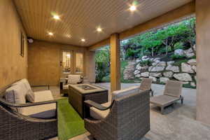 Covered patio featuring recessed lighting and a stucco wall finish