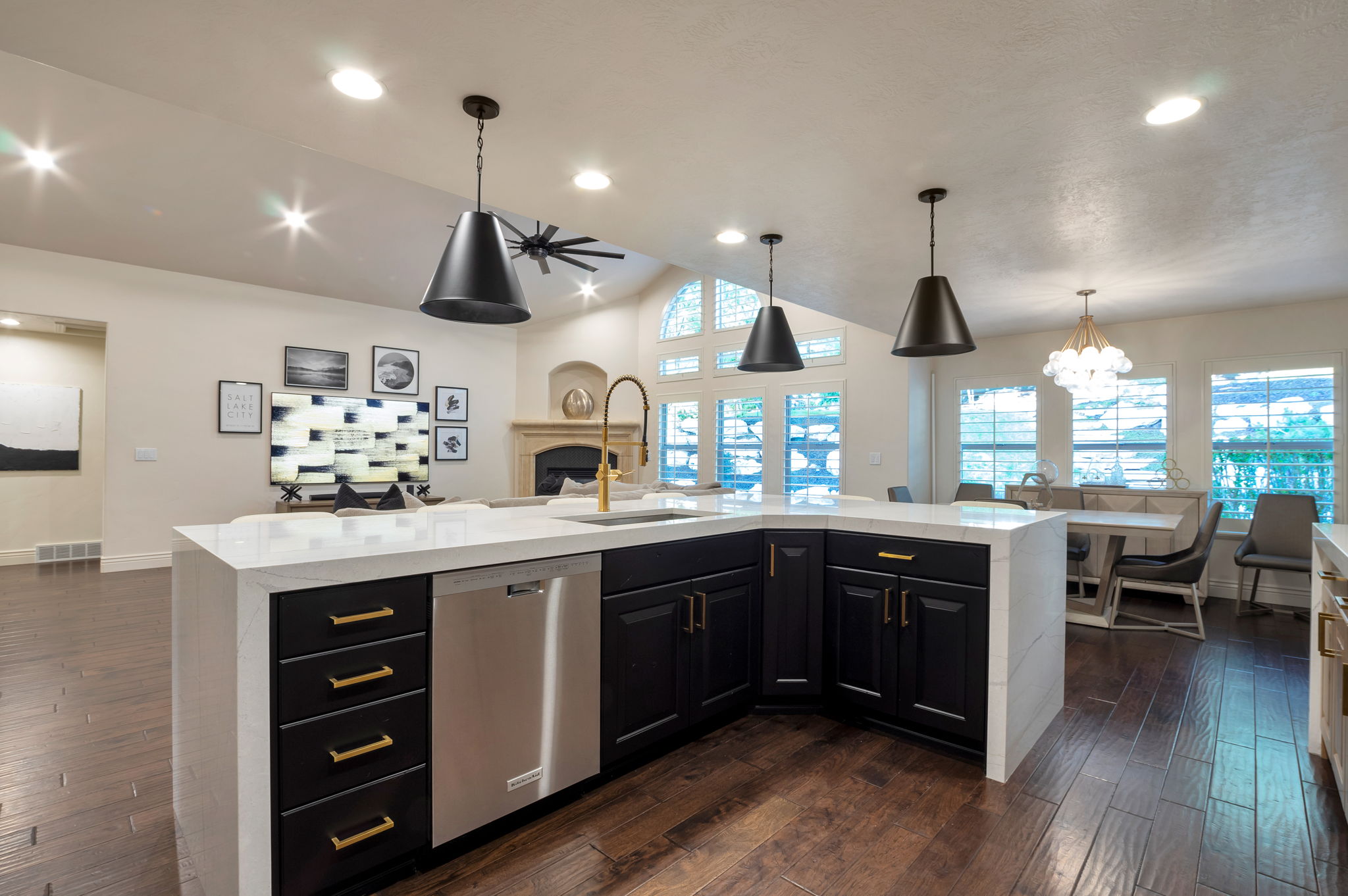The impressive waterfall island serves as the centerpiece of this beautifully updated kitchen, perfect for entertaining.