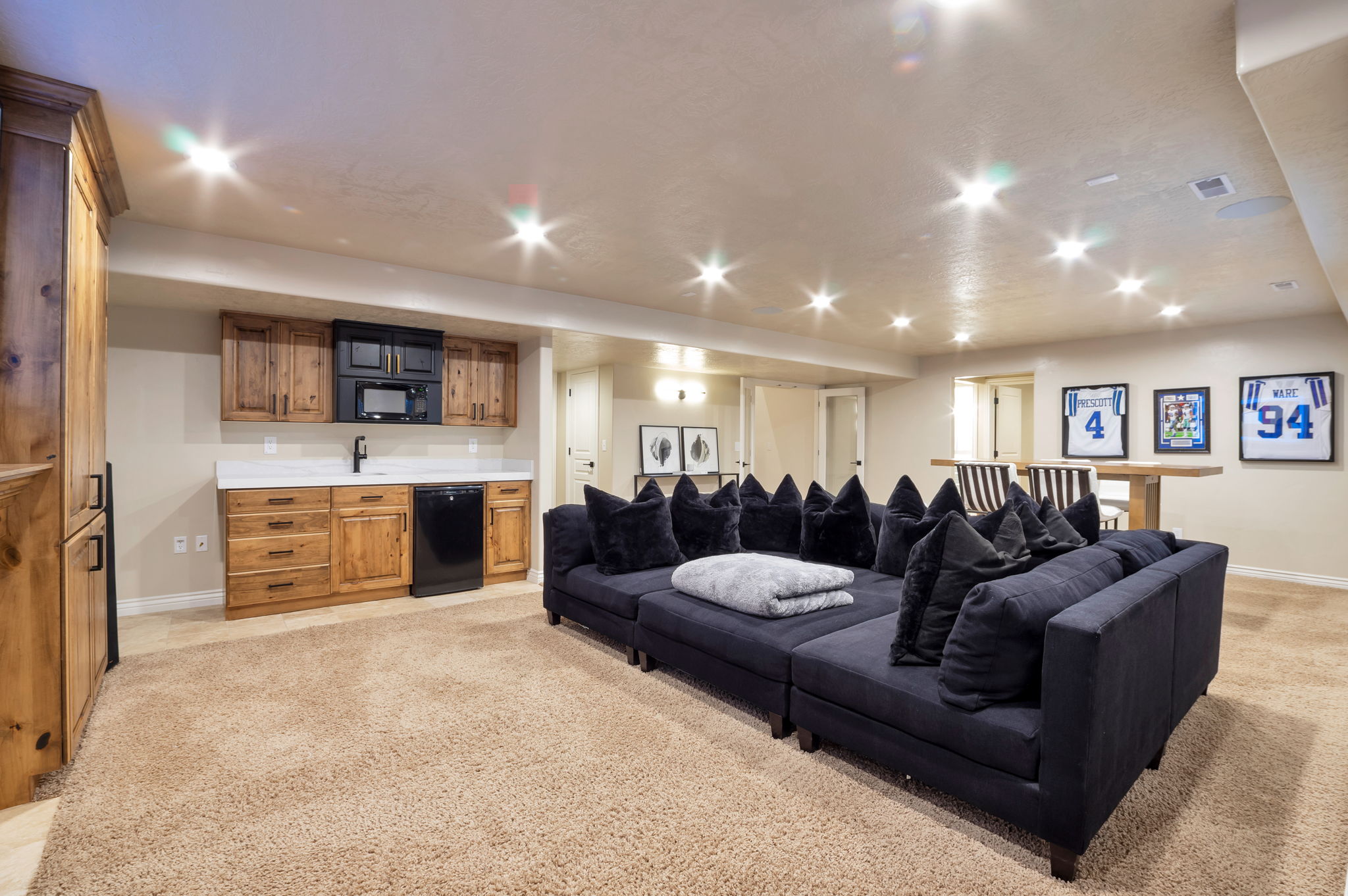 Open lower level offering exceptional flexibility for entertaining or multi-generational living.