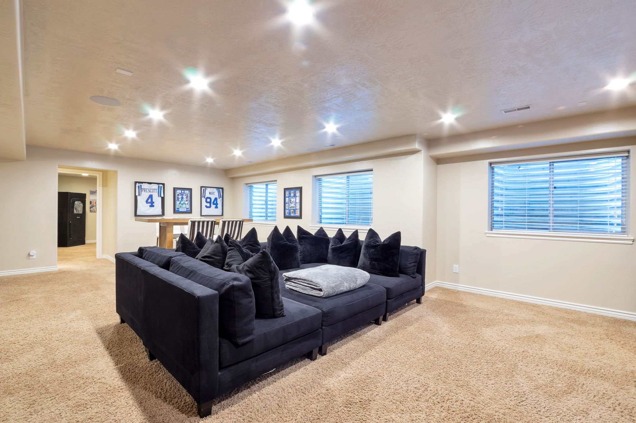 Expansive recreation room with room for multiple seating, gaming, and entertainment areas.