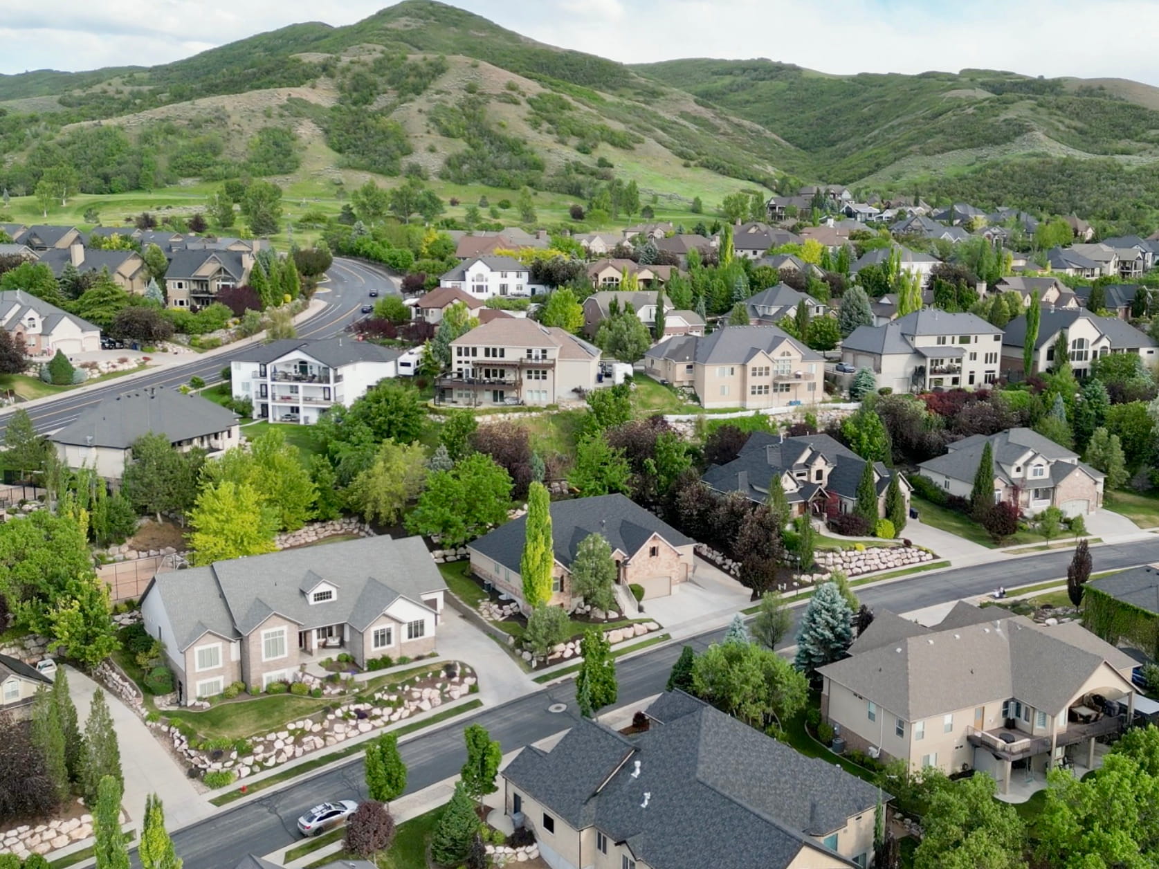 A premier location surrounded by custom homes, rolling foothills, and sweeping mountain vistas. Large homesites, mature trees, and abundant open space create a setting that feels both private and prestigious.