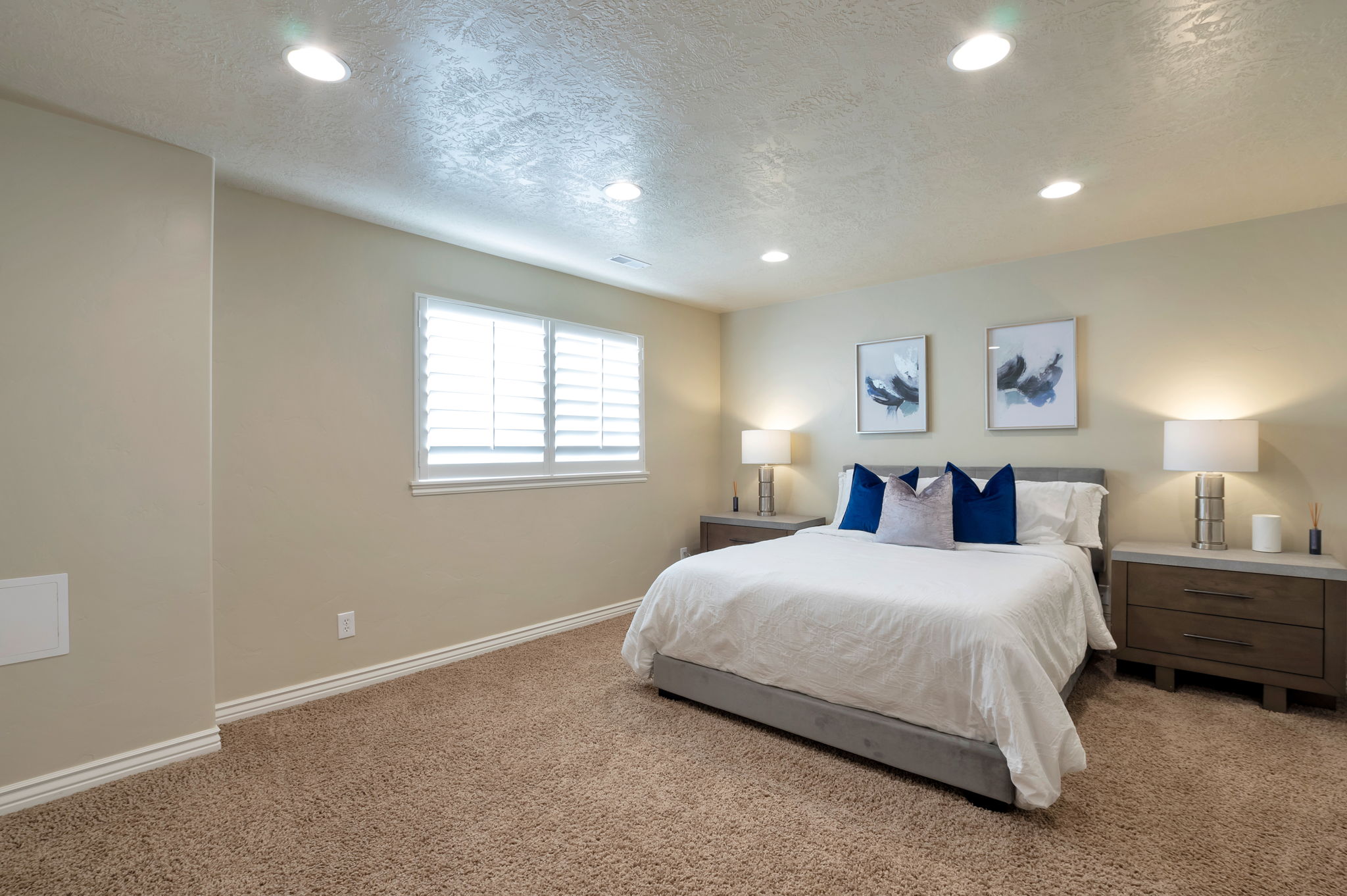 Comfortable guest suite with oversized layout and neutral designer finishes.