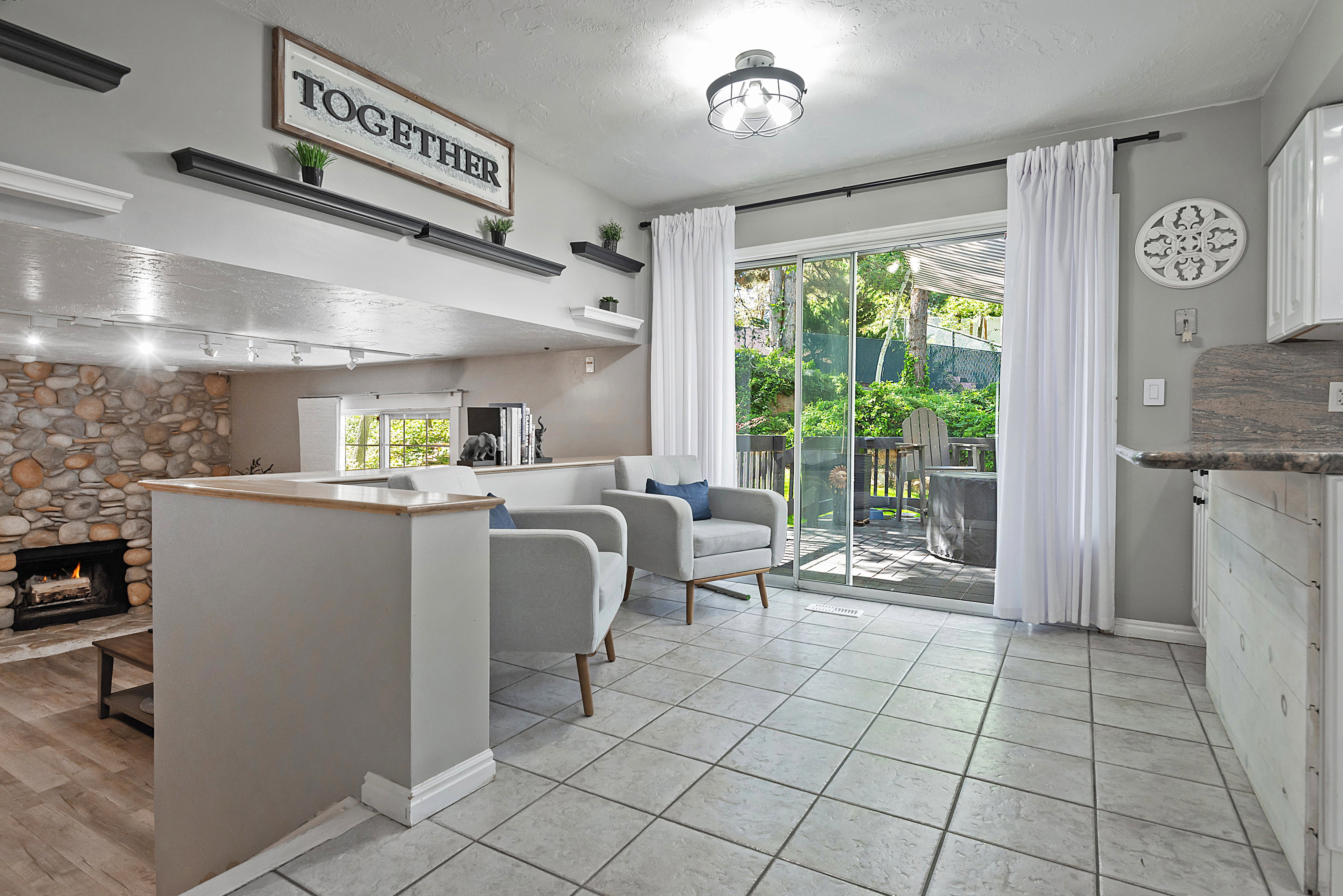 Sliding glass door opening to an outdoor deck
