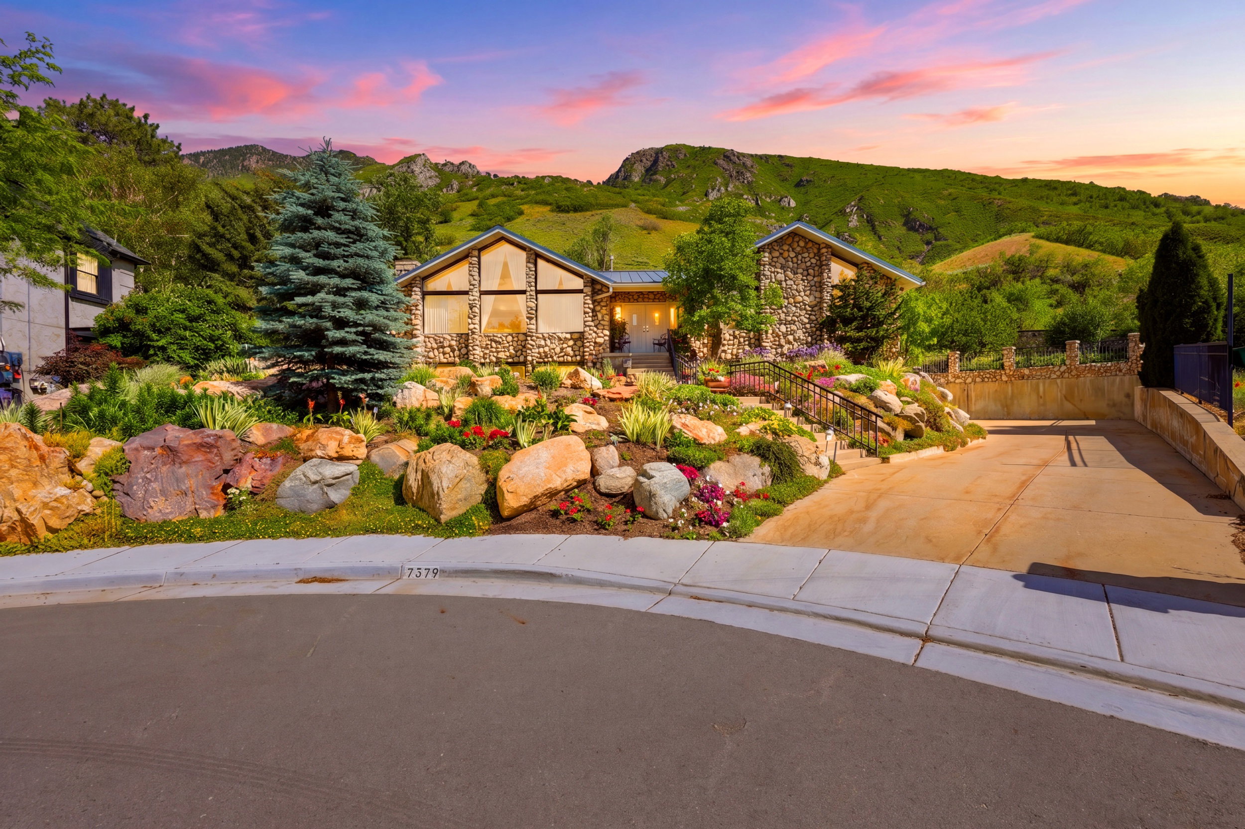 Stone-clad exterior featuring multiple architectural elements