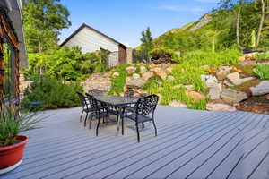 Spacious outdoor deck featuring gray composite decking