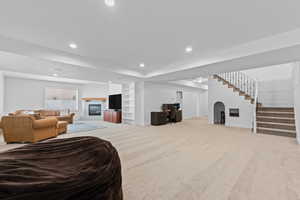 Spacious lower level featuring light-toned carpeting and recessed lighting throughout