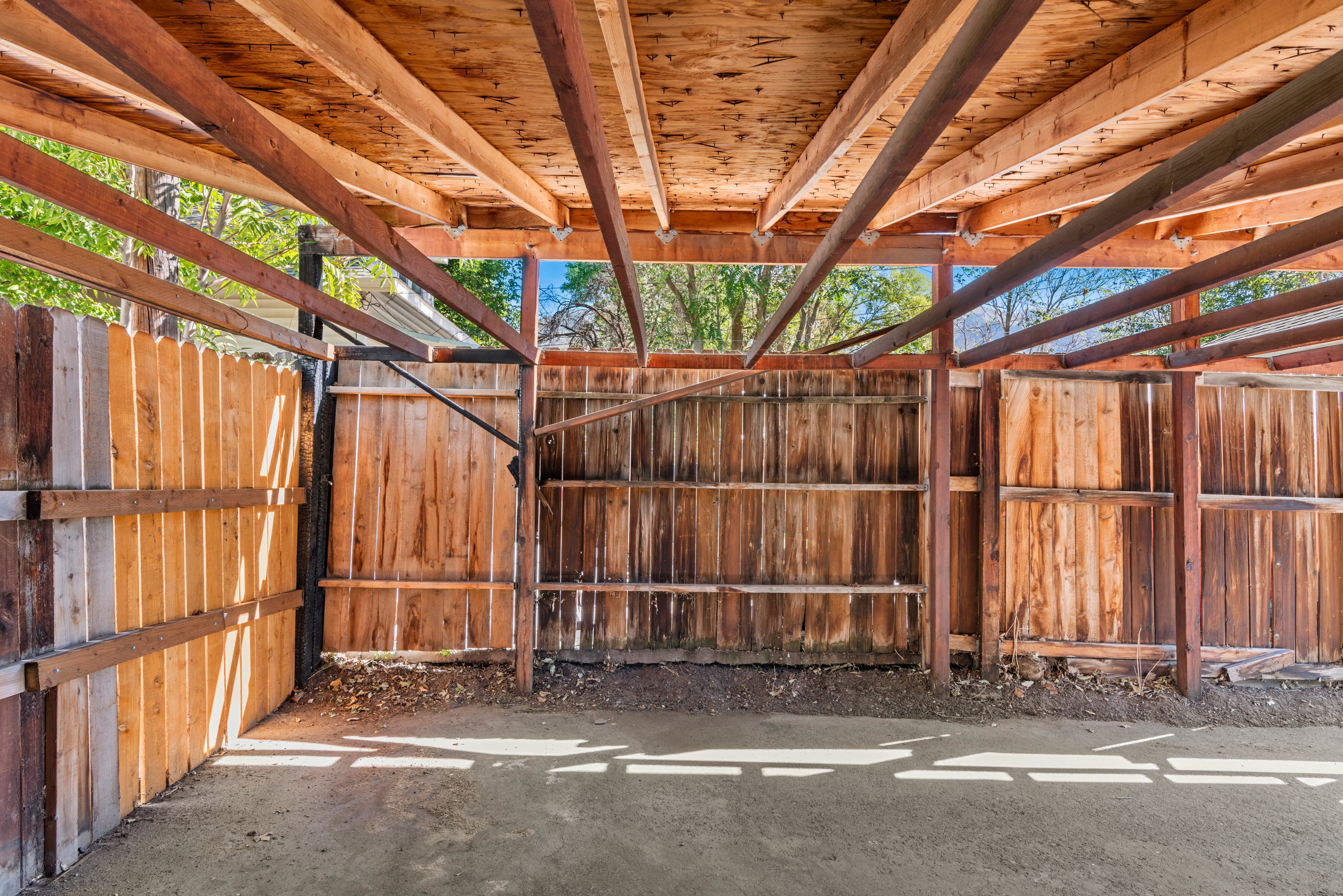 Carport with access from back service road