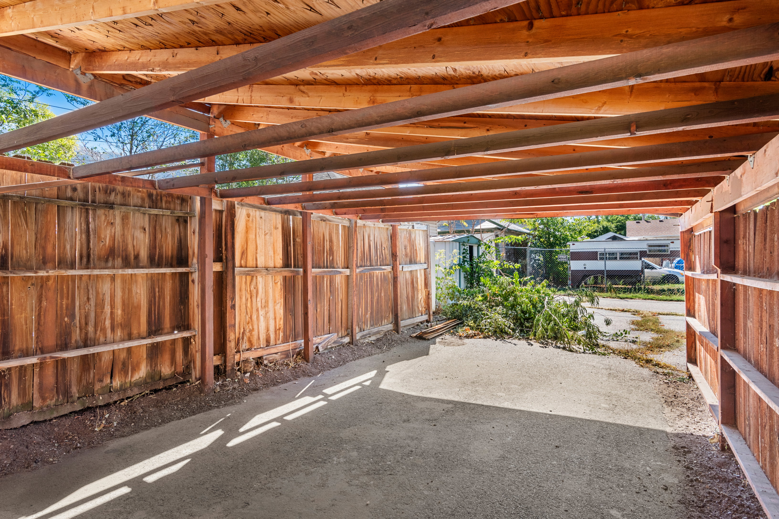 Carport with access from back service road